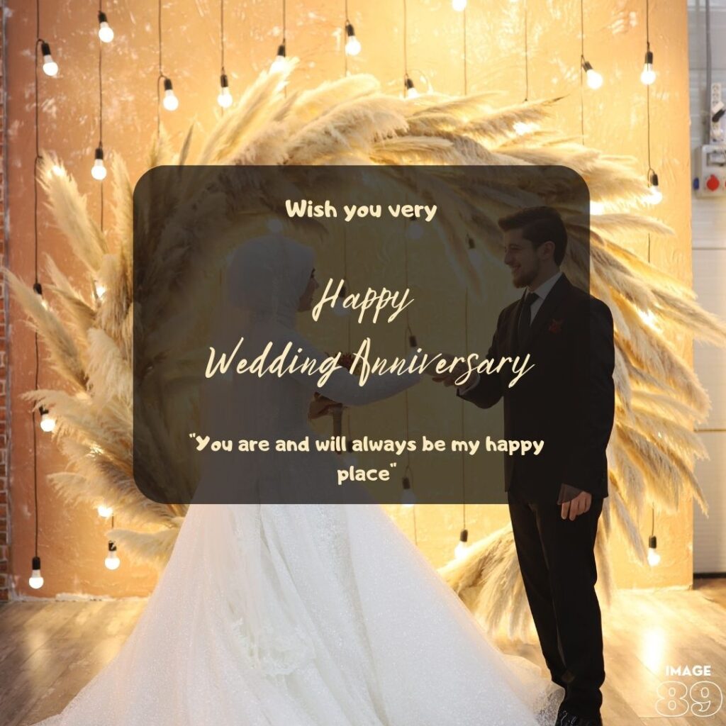 a beautiful yellow lights and feathers background a man in black tuxedo and a woman in white wedding gown holding a flowers bunch and couple holding hand and smiling to each other happy wedding anniversary image with love quotes