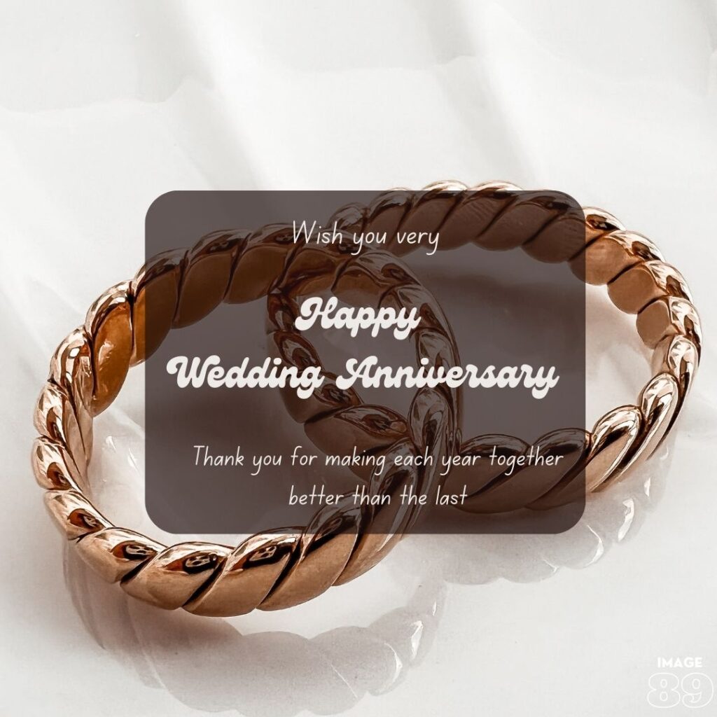 a couple gold rings set on a white background happy wedding anniversary image with love quotes