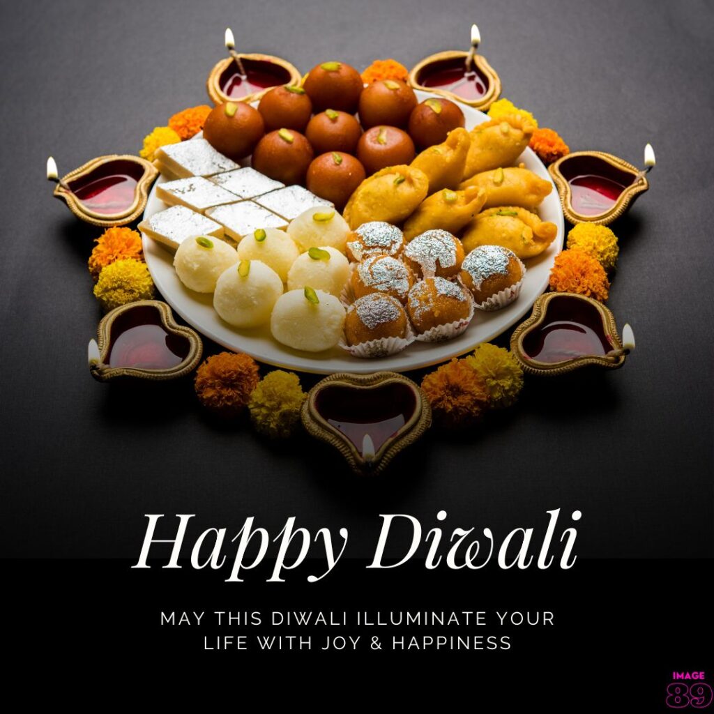 sweet and simple Happy diwali wishes image decorated with diyas and sweets thali